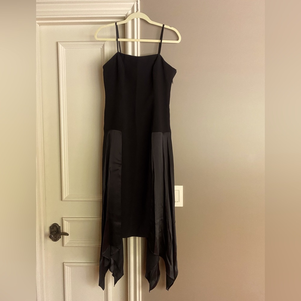 Cinq a Sept, black cocktail dress. Polyester top, ‘flowy’ silk bottom.